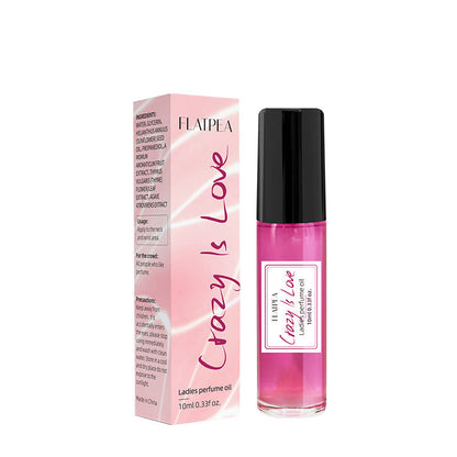 Carmine Juneberry Crazy In Love™ ball perfume oil for women, bodycare product with a decorative perfume container.