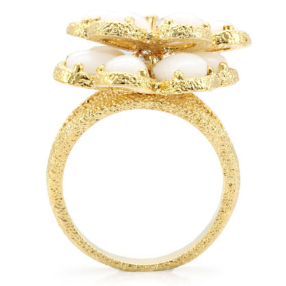 Gold brass ring with synthetic white glass from Turquoise Tiger, featuring a polished band and a central synthetic glass accent.