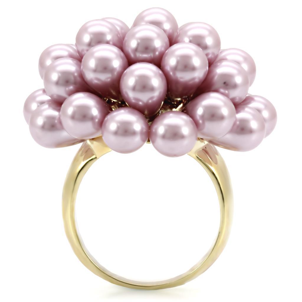Gold brass ring with a synthetic pearl in light amethyst, featuring Turquoise Tiger branding and elegant, minimalist design.