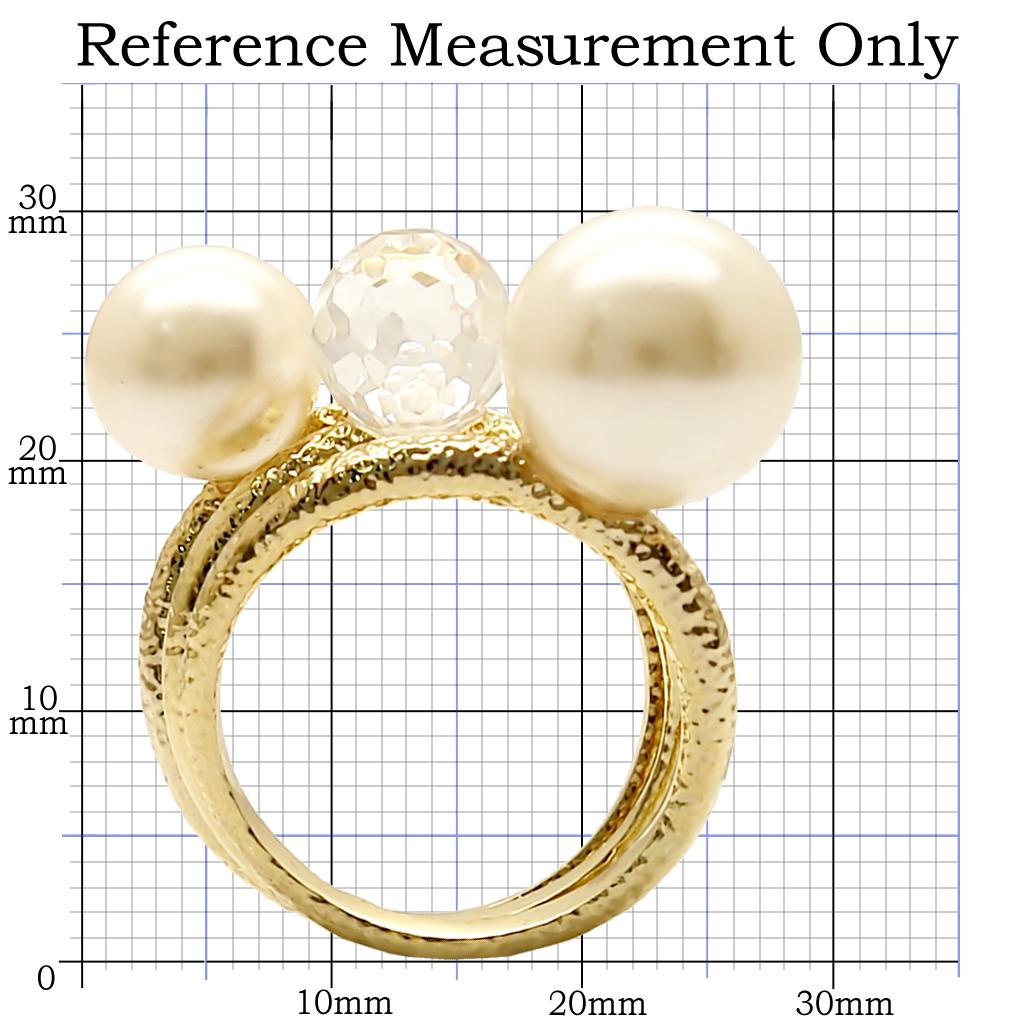 Gold brass ring with synthetic pearl in citrine yellow by Turquoise Tiger, showcasing the elegant band and decorative pearl detail.