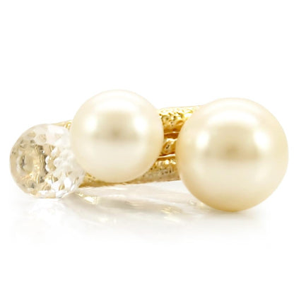 Gold brass ring with synthetic pearl in citrine yellow by Turquoise Tiger, showcasing a polished band and elegant design.