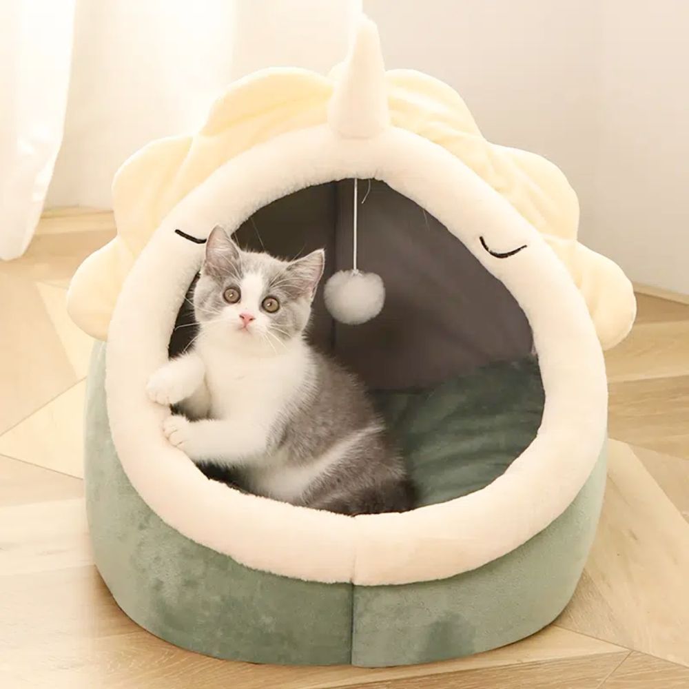 Yellow Pandora dinosaur pet house with soft bedding and toy, designed for small pets and featuring colorful, cozy dinosaur-themed decor.