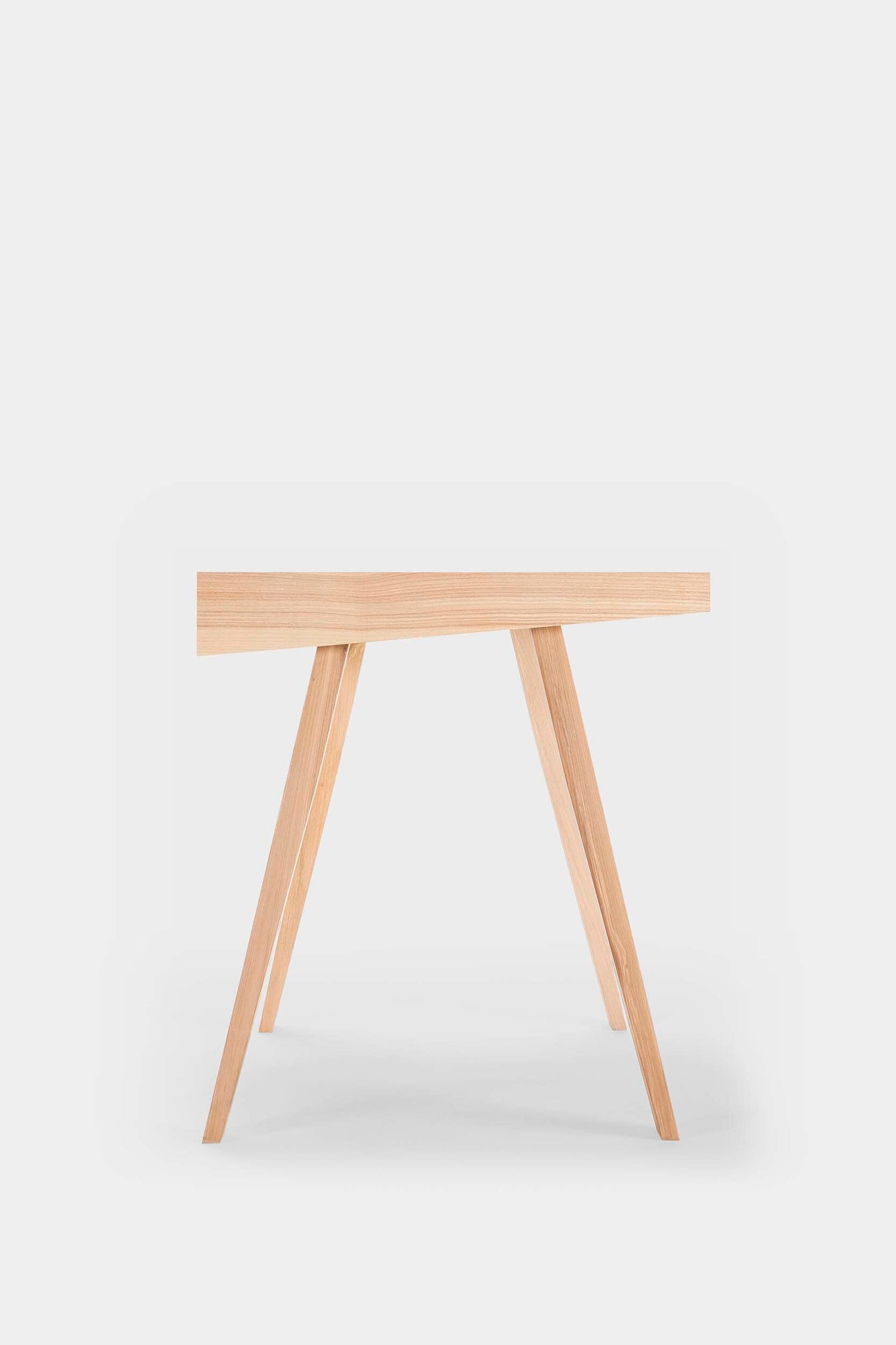Aquamarine Poppy 4.9 desk, a modern furniture piece with a sleek surface and sturdy design, suitable for home or office use.