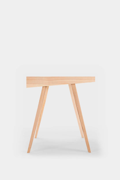 Aquamarine Poppy 4.9 desk, a modern furniture piece with a sleek surface and sturdy design, suitable for home or office use.