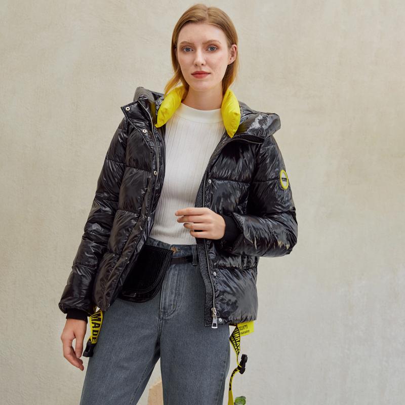 Warm women’s winter parka coat by Jade with shiny, hooded design and long sleeves, ideal for cold weather.