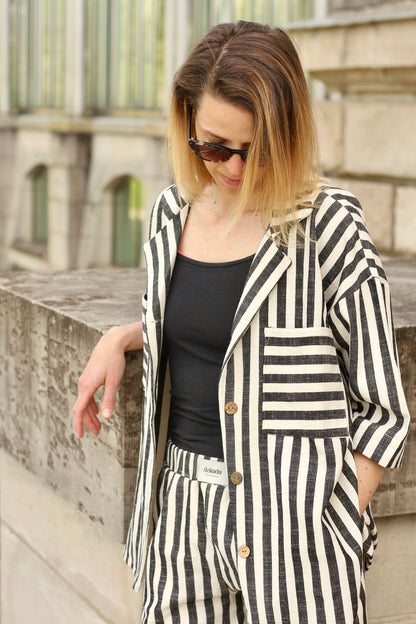 Black handwoven shirt from Blue Helios, a stylish top with intricate woven details and a relaxed fit.