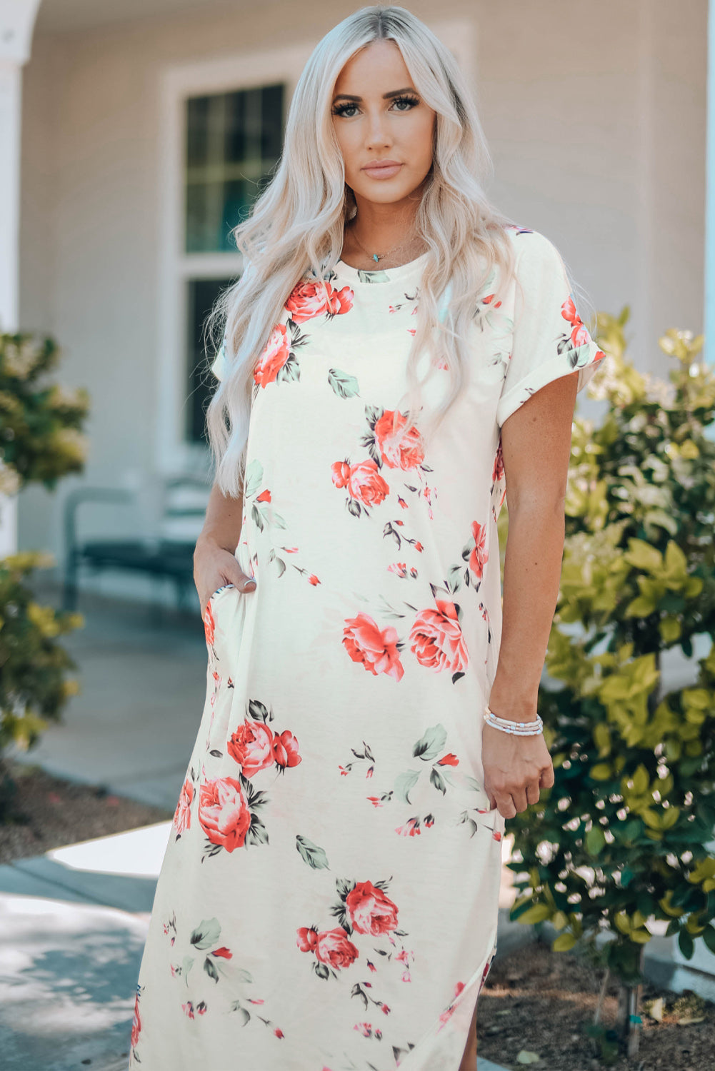 White floral print T-shirt dress with side slits by Harlequin Daisy, perfect for a casual, stylish look.