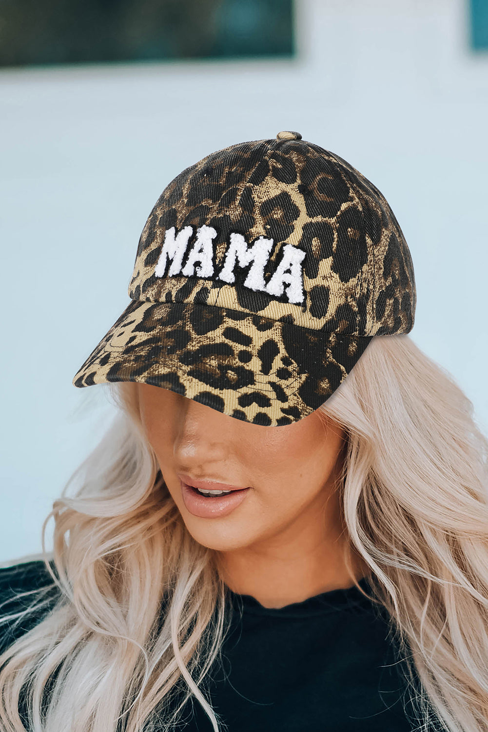 Leopard MAMA embroidered baseball cap by Carmine Juneberry featuring a leopard print design and adjustable strap.