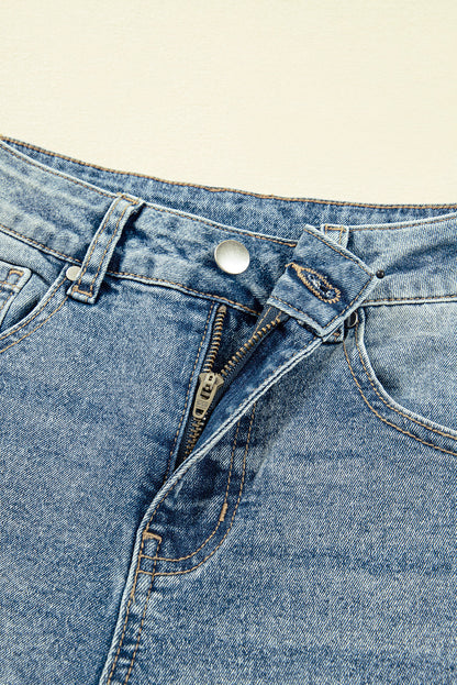 Vintage washed denim shift jeans for women by Byzantium Bay, showcasing classic seam details and relaxed fit.