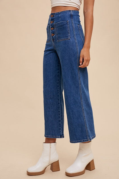 Jade Icarus Annie Wear button fly high waist jeans with classic denim fabric and detailed stitching.