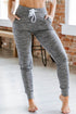 Gray Carmine Juneberry joggers with drawstring waist and side pockets, perfect for comfortable casual wear.