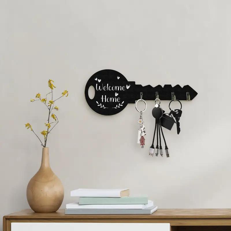 Vintage wooden key-shaped wall hook by Pear Daisy, decorative home and garden key hook for organizing or adding rustic charm.