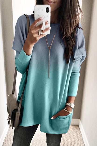 Gray color block pocketed side long top from Harlequin Daisy, featuring a relaxed fit and side pockets for casual comfort.