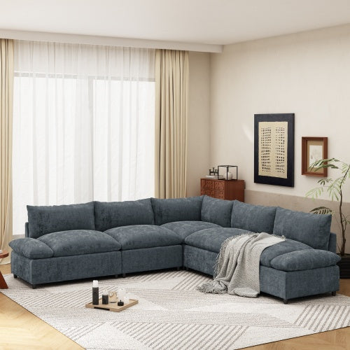 Carmine Juneberry LuneluX Home 115.5-inch deep gray modular sectional sofa with built-in storage in a modern living room setting.