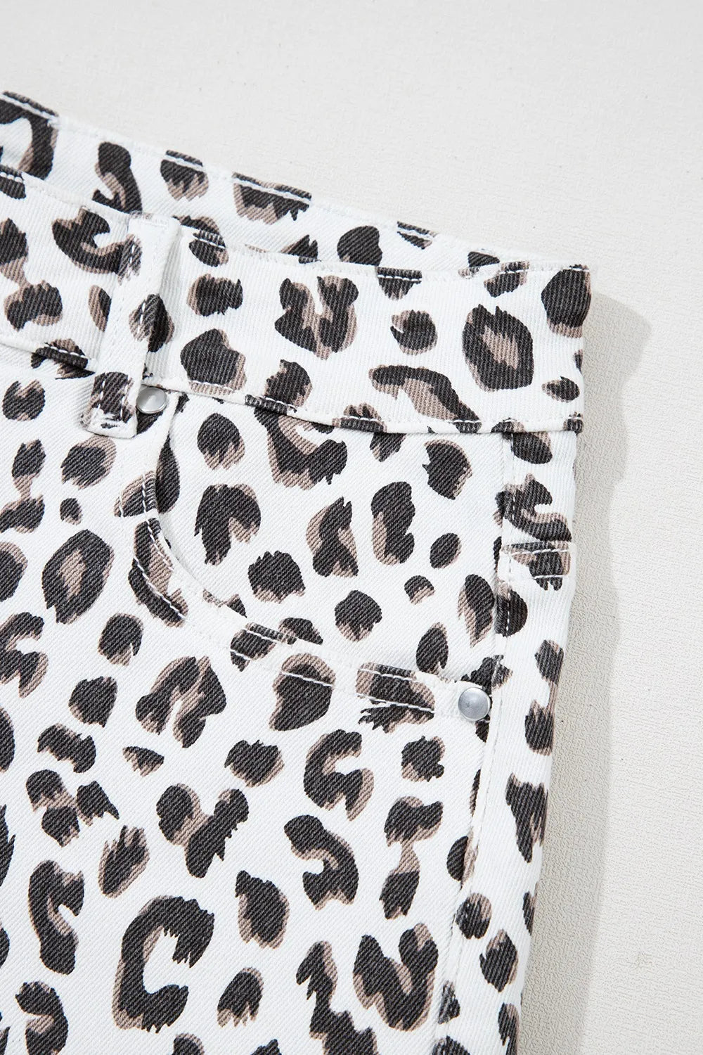 Leopard print frayed hem denim shorts for women by Ruby Styx, featuring distressed details and a stylish, casual fit.