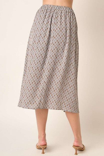 Automotive Jade Icarus Mittoshop printed midi skirt featuring vibrant patterns and a stylish midi length.