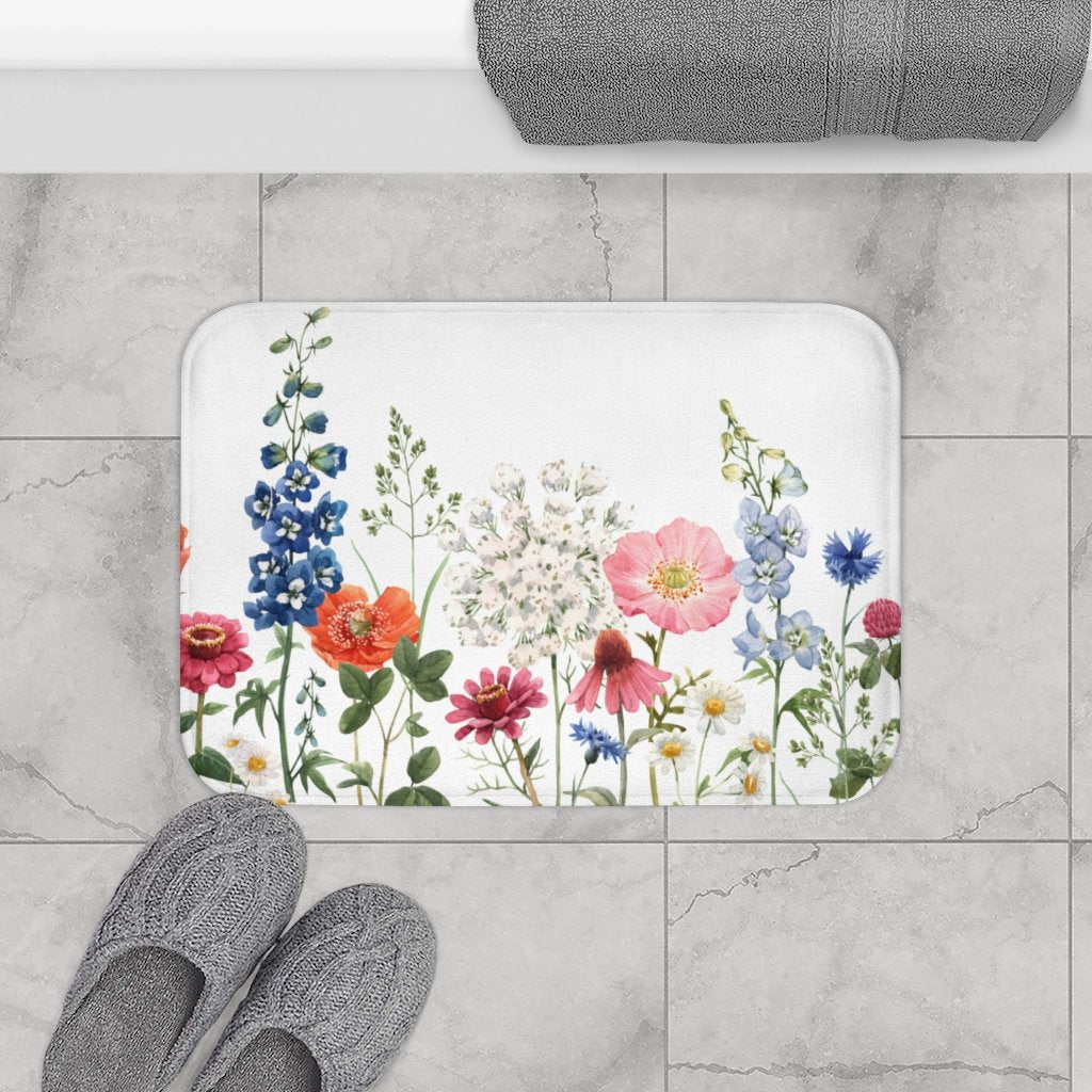 Spring floral garden bath mat by Yellow Pandora featuring colorful floral design for bathroom decor.