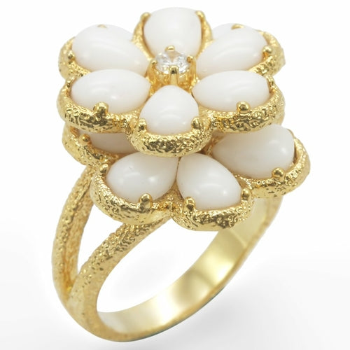 Gold brass ring with white synthetic glass inlay from Turquoise Tiger, showcasing a polished band and elegant design.