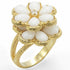 Gold brass ring with white synthetic glass inlay from Turquoise Tiger, showcasing a polished band and elegant design.