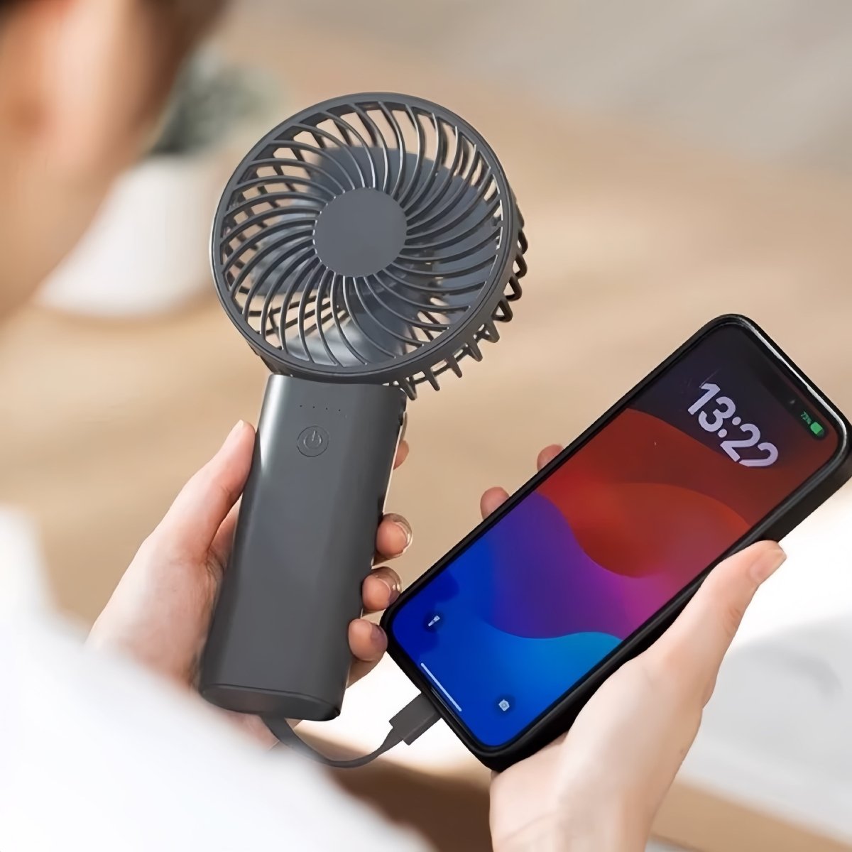Inspecial Home 2-in-1 portable mini fan with high-speed cooling and built-in power bank, foldable for easy home decor use.