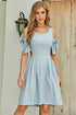 Pear Daisy cutout tied cold-shoulder dress with ruffled sleeves, displayed on a hanger for home and garden decor.