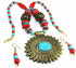 Silver Hestia flower medallion boho necklace and earrings set featuring floral designs and intricate silver detailing.