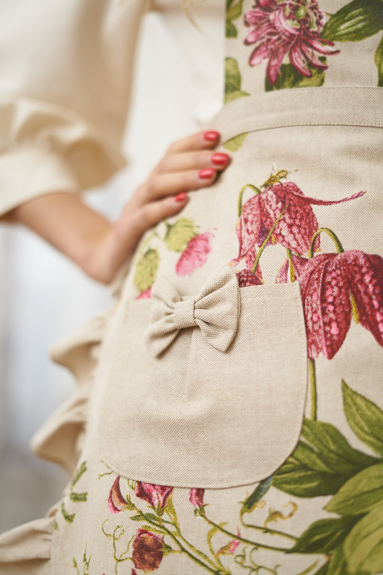 Ladies printed poly-cotton half apron with floral hortensia design, perfect for home decor by Rose Trillium.