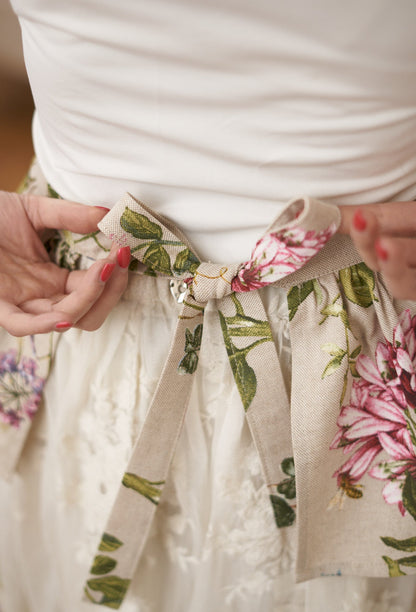 Ladies printed poly-cotton half apron with floral hortensia design, perfect for home decor from Rose Trillium.