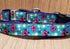 Green Thalassa large and medium lady bug collar for pets, featuring colorful lady bug design on a durable pet collar.