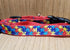 Large pet collar with autism puzzle piece design from Green Thalassa, featuring colorful puzzle patterns on durable petwear.