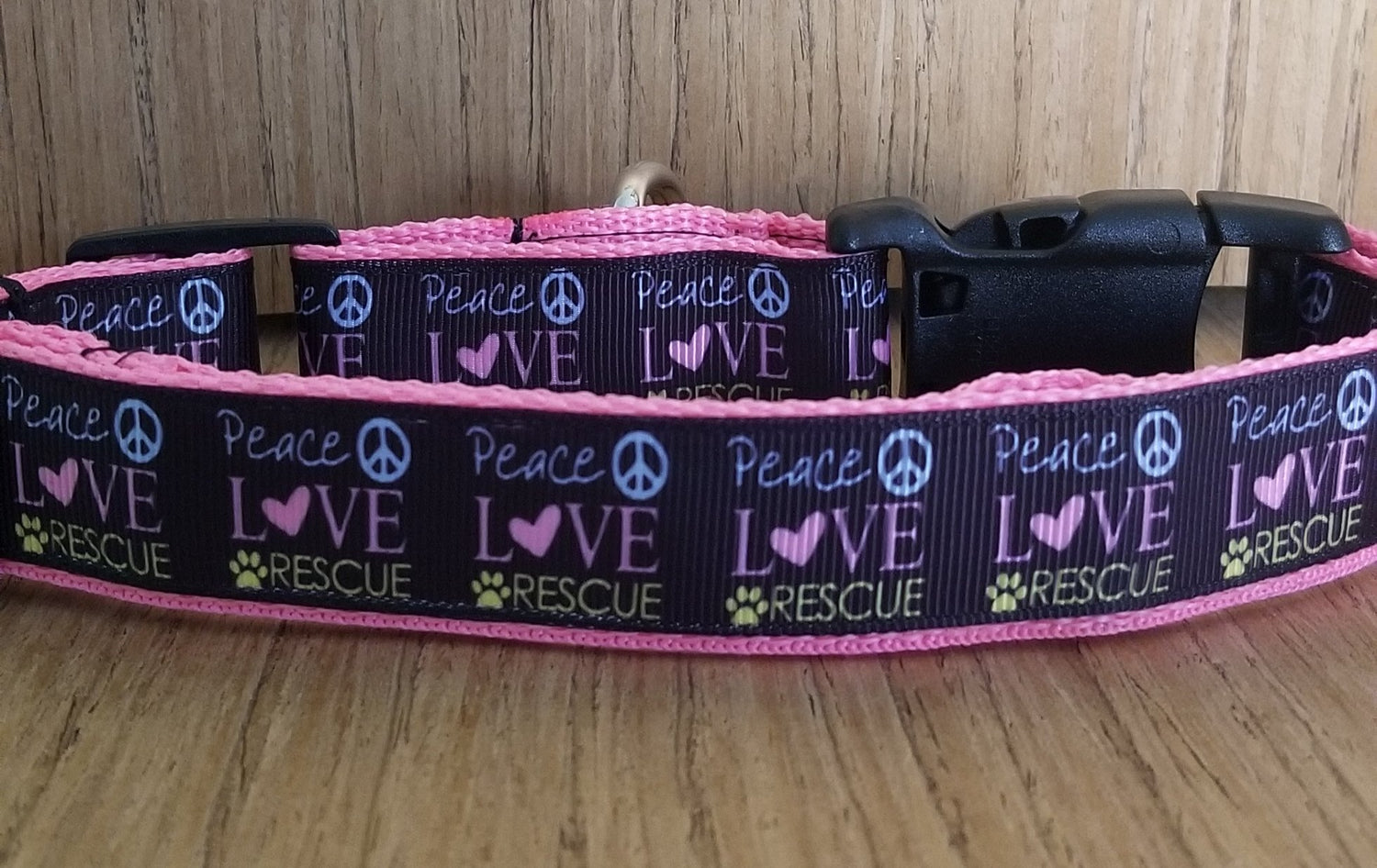 Green Thalassa large pink collar featuring Peace, Love, and Rescue design for pets, made of durable material.