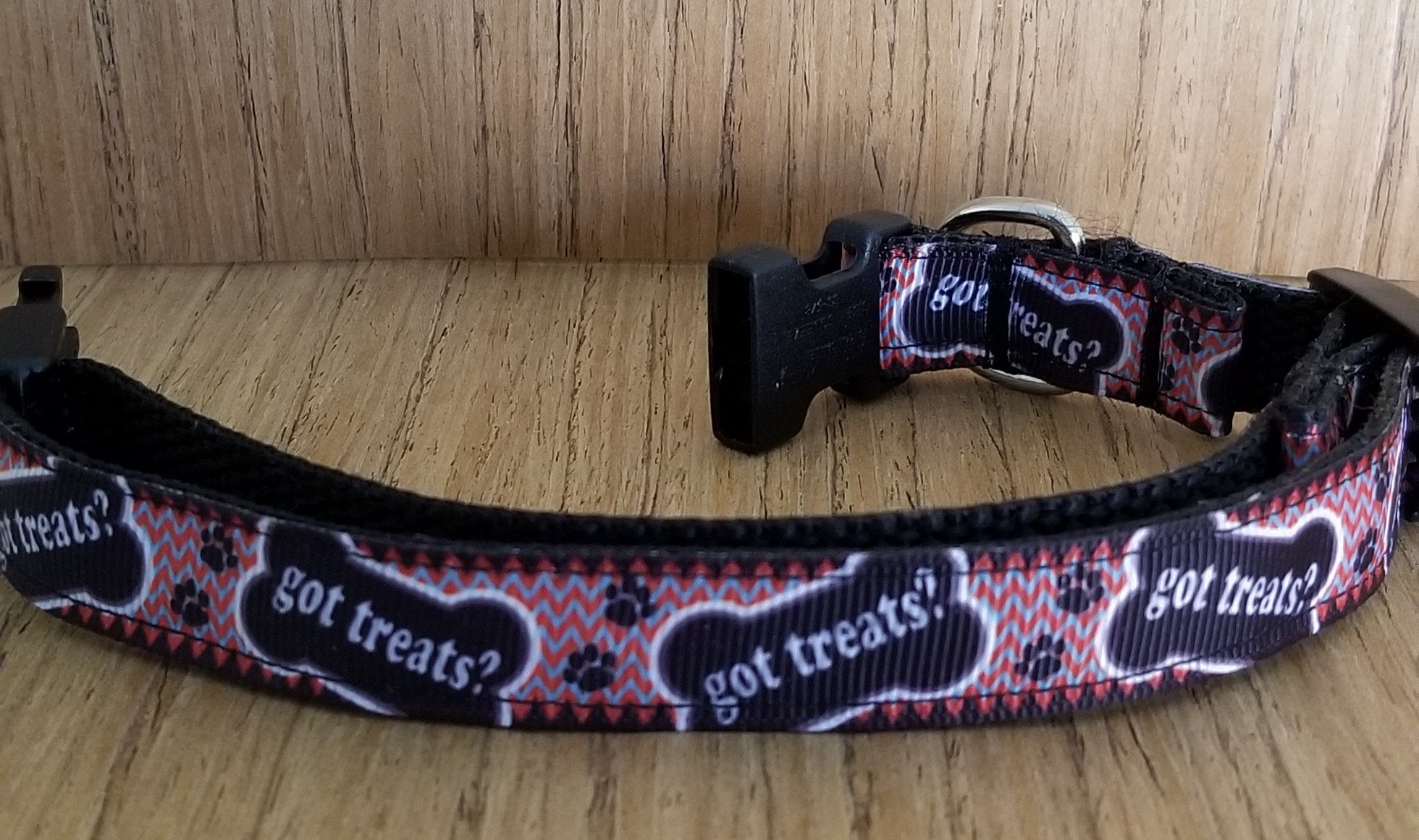 Small green pet collar with "Got Treats?" text from Green Thalassa, designed for dogs or cats, on a white background.