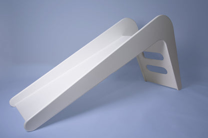 White wooden indoor slide for kids by Rose Metis, featuring a sleek design and smooth finish, ideal for playrooms.