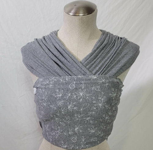 Amber Leto Snüg baby clothing set featuring soft, cozy fabric and playful design for comfortable infant wear.