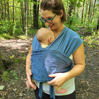 Cute baby clothing by Amber Leto, featuring a cozy Snüg outfit with soft fabric and adorable design for infants.