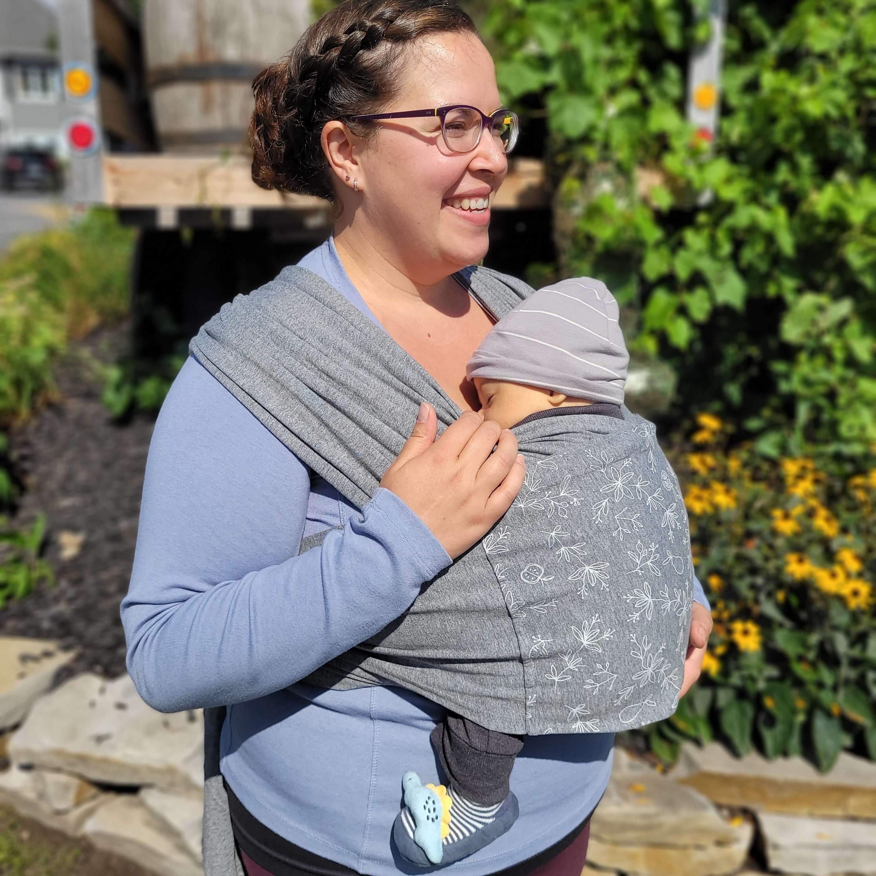 Soft pink baby clothing by Amber Leto, featuring a cozy Snüg design for comfortable infant wear.