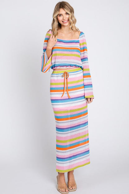 Colorful multi-stripe maxi skirt by Jade Icarus with flowing fabric and vibrant pattern, displayed on a mannequin.