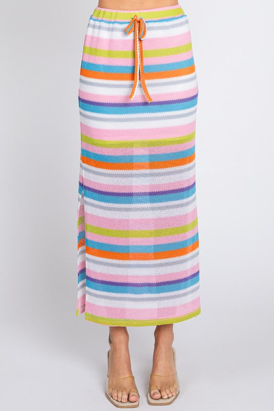 Colorful striped maxi skirt from Jade Icarus, featuring a multi-color design with flowing fabric and comfortable fit.