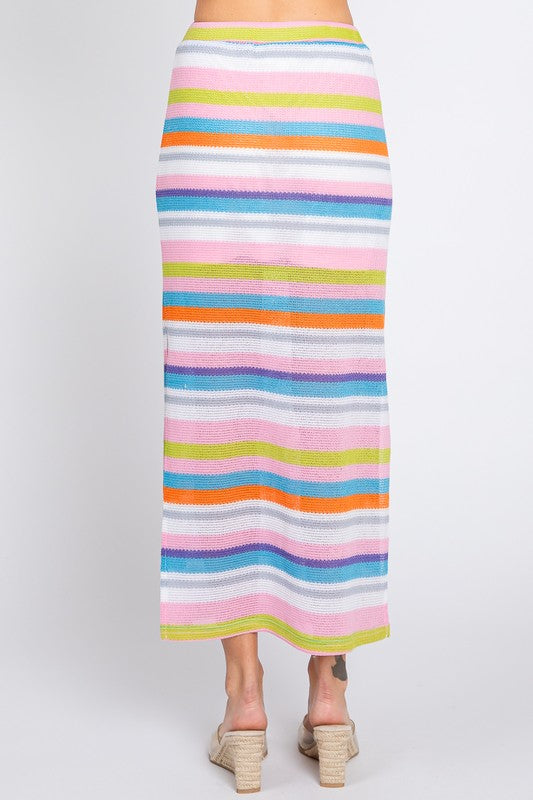 Multi-color striped maxi skirt by Jade Icarus, showcasing flowing fabric with vibrant horizontal stripe patterns.