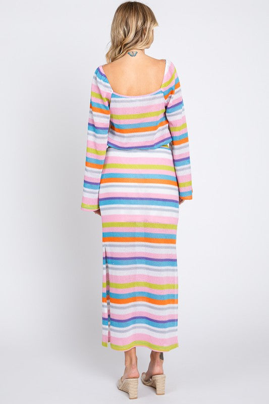 Multicolor stripe maxi skirt by Jade Icarus featuring a flowing design and vibrant horizontal stripes, displayed on a mannequin.