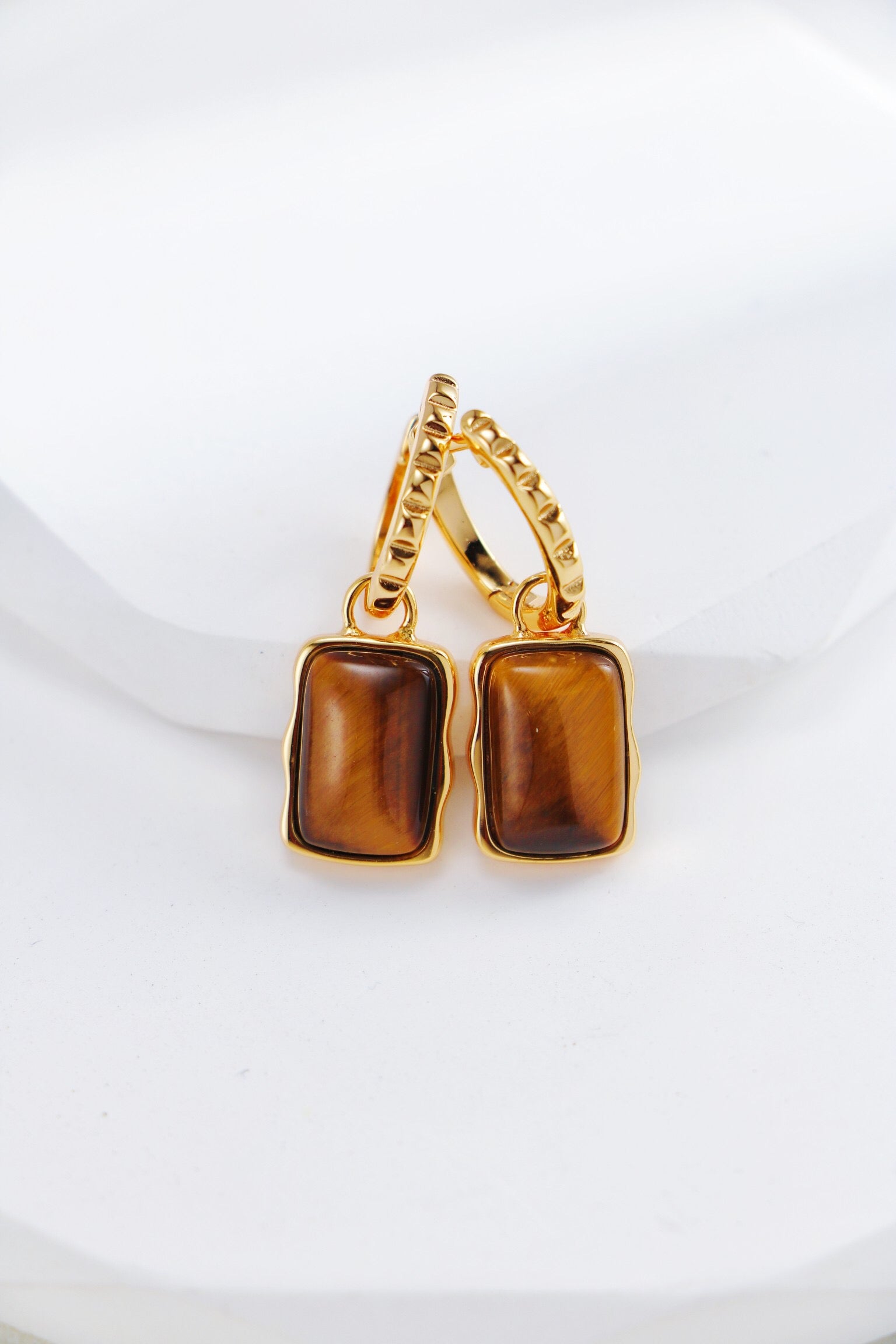 Rectangle-shaped tiger eye long earrings from Amethyst Arachne featuring polished stone and elegant dangle design.