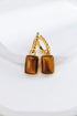 Rectangle shape tiger eye long earrings from Amethyst Arachne featuring polished stone and elegant jewelry design.
