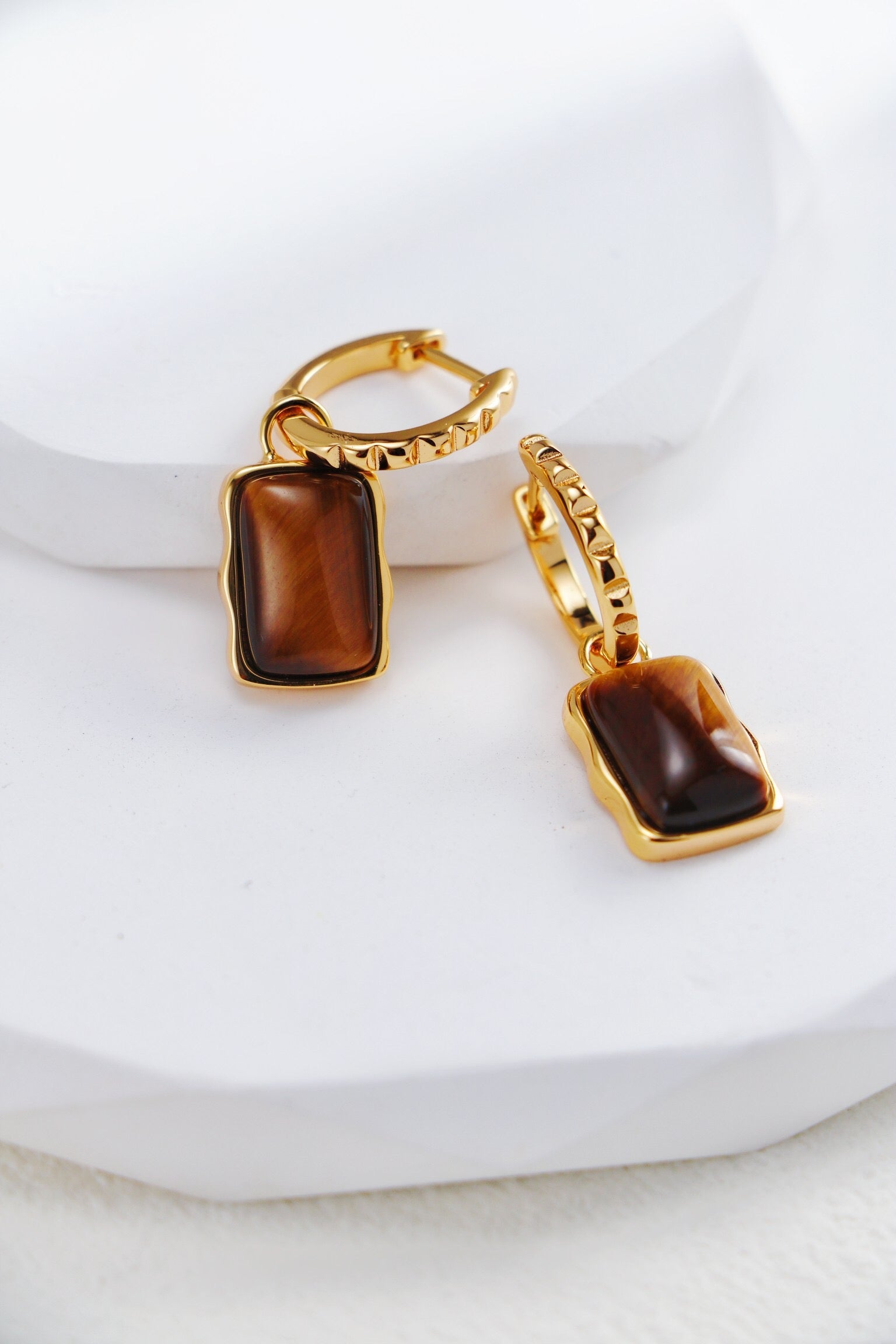 Rectangle-shaped tiger eye long earrings by Amethyst Arachne featuring polished stone drops and elegant jewelry design.