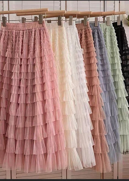 Automotive tiered midi skirt by Jade Icarus featuring layered fabric and a stylish, modern design.