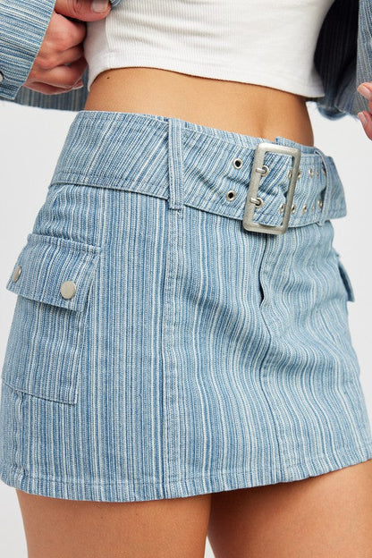 Jade Icarus belted mini denim skirt, featuring a classic denim fabric with a stylish belt, displayed on a mannequin.