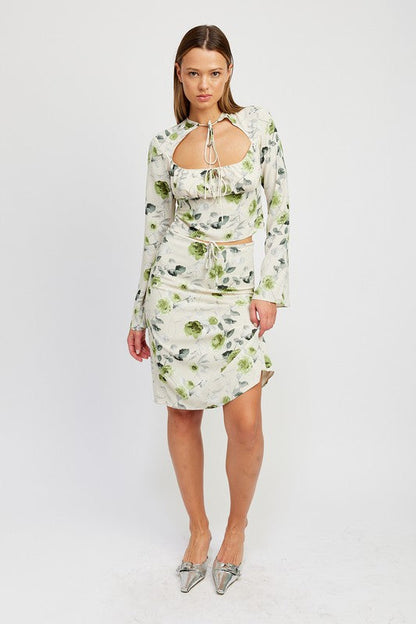 Jade Icarus floral midi skirt with front drawstring, featuring a colorful floral pattern and a stylish, flowy design.