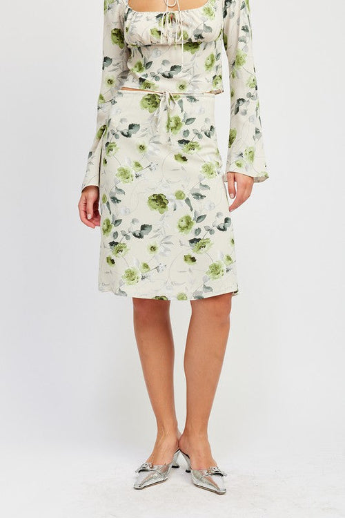 Floral midi skirt with front drawstring by Jade Icarus, featuring a colorful floral pattern and a stylish, casual design