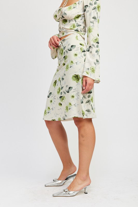 Jade Icarus floral midi skirt with front drawstring, featuring a colorful floral pattern and lightweight fabric.