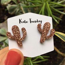 Maroon rose gold cactus sparkly acrylic earrings by Olive Felix featuring glittery cactus design on a white background