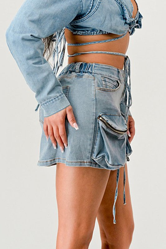 Denim Daze wrap skirt by Jade Icarus, featuring a stylish automotive-inspired design with denim fabric and wrap-around style.